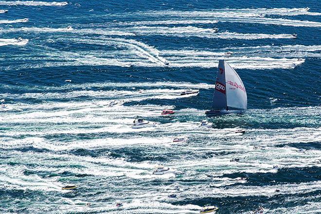 The escort: Wild Oats XI surges up the Derwent River towards Hobart amid a sea of white on her way to a historic eighth line honours victory in the Rolex Sydney Hobart Yacht Race.  ©  Andrea Francolini / Audi http://www.afrancolini.com